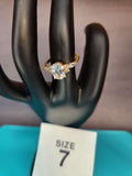 Size 7 Oval Cut Solitaire with Accents Ring