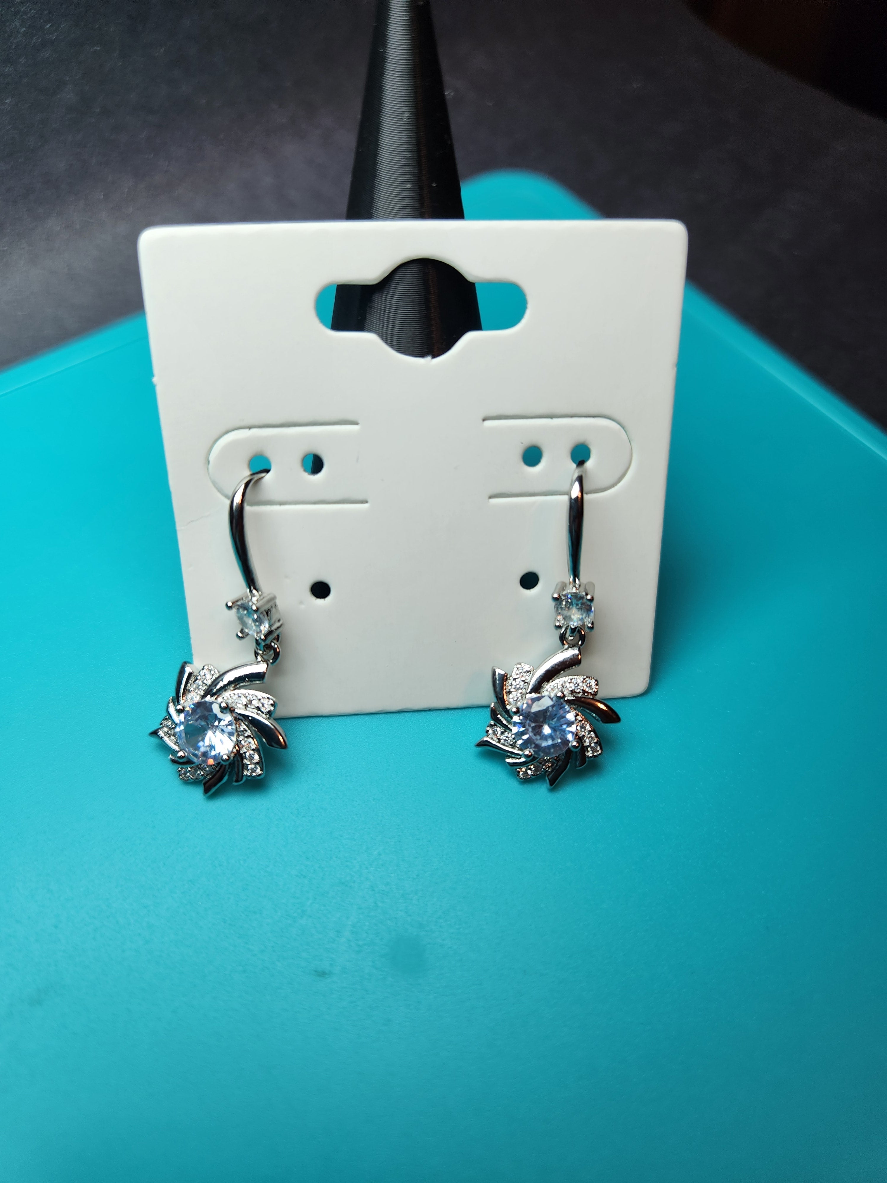 Ice Blue Swirl Pinwheel Dangle Earrings