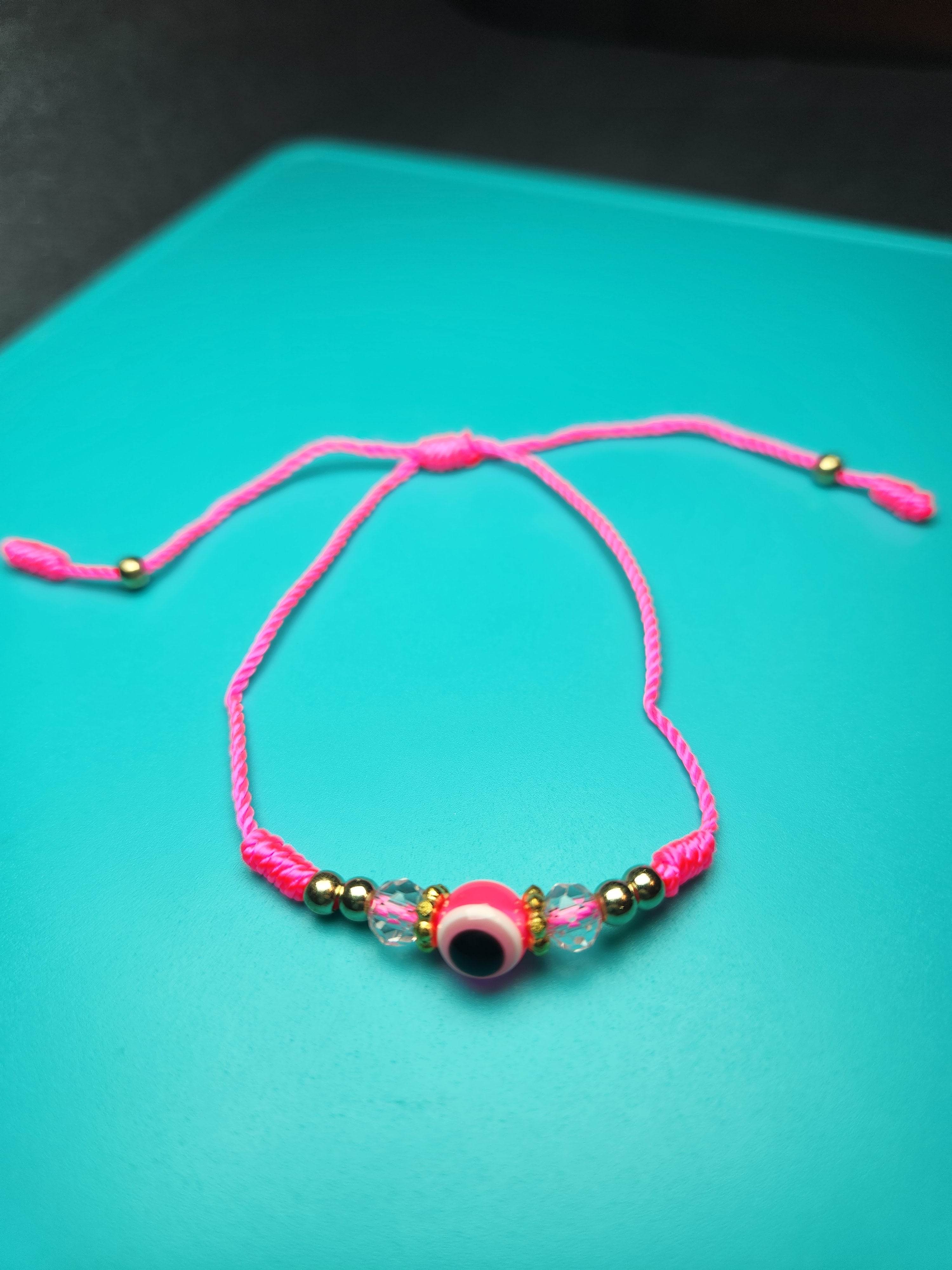 Adjustable Neon Pink Evil Eye Cord Bracelet