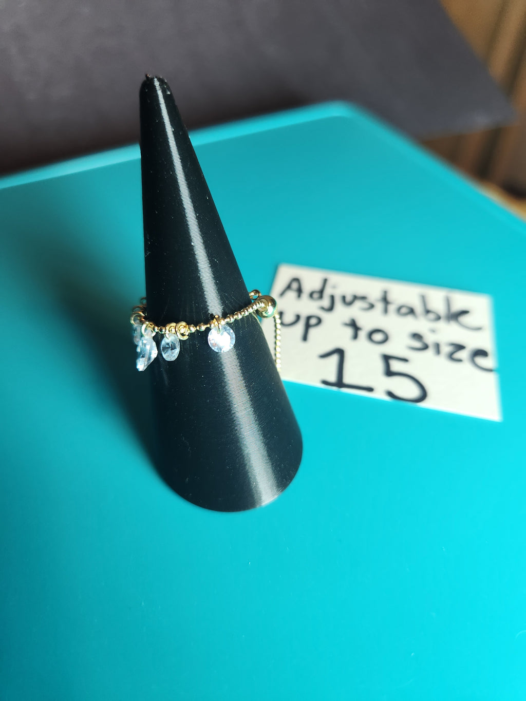 Adjustable Stainless Steel Dangle Ring – Fits Up to Size 15